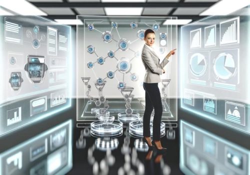 businesswoman analyzing holograms